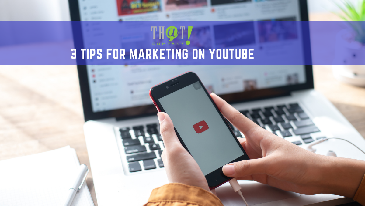 YouTube 마케팅 | 3가지 성공적인 팁 Marketing on YouTube | A Hand Holding A Phone Infront Of A Laptop Showing YouTube Apps